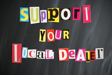 "SUPPORT YOUR LOCAL DEALER" letters on Chalkboard