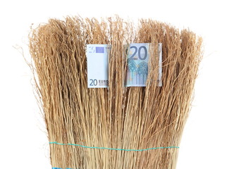 Broom sweep the euro close-up