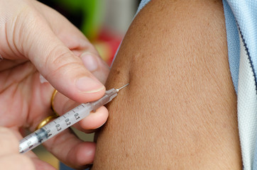 closeup of injection vaccine