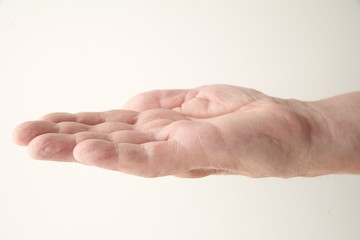 man holds his hand palm up