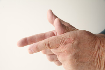 man using finger shooting gesture