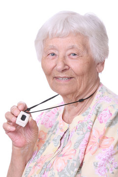 Senior woman wearing a medical emergency panic button pendant