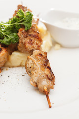 Skewered meat with vegetables