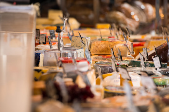 Grocery Store. Cheese Glass Case Closeup