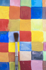 brush and colored background