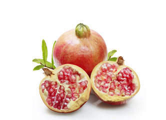 Ripe pomegranates with leaves