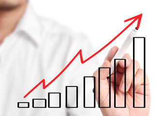 Business man drawing  graph