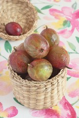 Gooseberry in the small basket