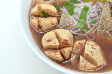 noodle served with meat balls, pork and liver