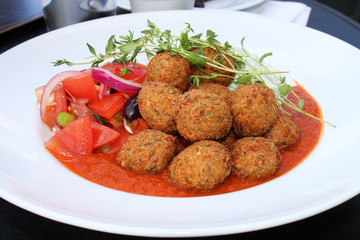 Falafel With Tomato Sauce & Cucumber Salad.