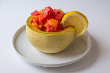 Fresh fruit salad in cantaloupe bowl