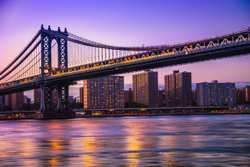 Fototapeta na wymiar Manhattan Bridge and New York City at sunset