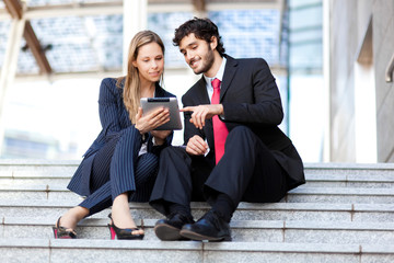 Two business people at work