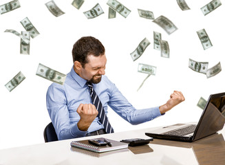 young modern businessman excited with his success while working