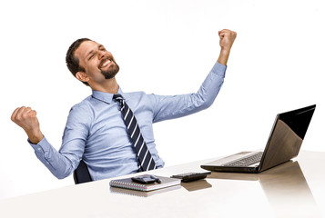 young modern businessman excited with his success while working