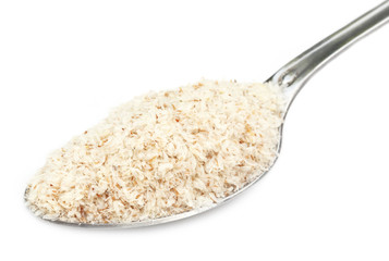 Medicinal Isabgol or psyllium husks on a spoon