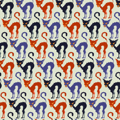 Halloween seamless pattern with black cats.