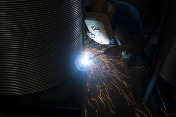 Fototapeta sparks coming out of welding torch obraz