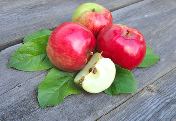 Fresh apples on the wooden bench