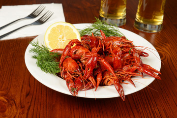 boiled crayfishes on white plate