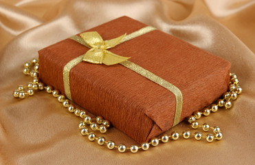 Romantic parcel on gold cloth background