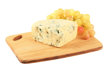 Tasty blue cheese and grape on cutting board, isolated on white