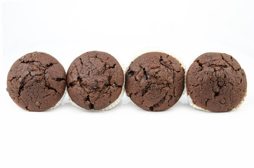 Chocolate muffins isolated on white