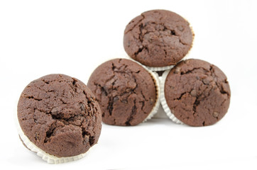 Chocolate muffins isolated on white