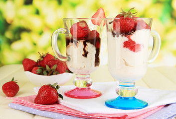 Delicious strawberry desserts in glass vase