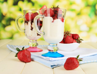 Delicious strawberry desserts in glass vase