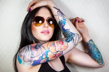 Foto op Aluminium beautiful young woman with a tattoo.. © ninared