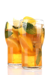 Iced tea with lemon and mint isolated on white