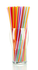 Many straws in glass isolated on white