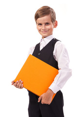 School boy is holding a book