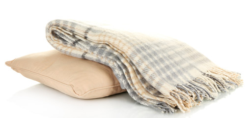 Woolen checkered plaid and pillow, isolated on white