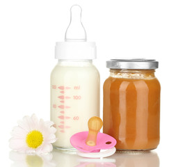 Baby food, bottle and juice isolated on white