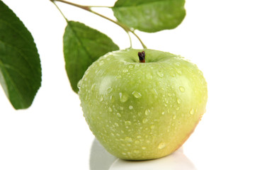 Juicy green apple with leaves, isolated on white