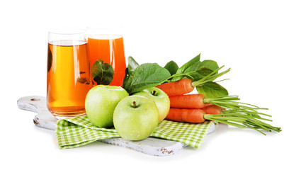 Glasses of juice, apples and carrots, isolated on white
