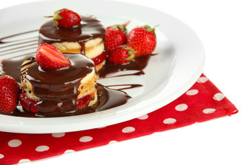 Tasty biscuit cakes with chocolate and berries