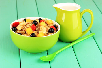 Oatmeal with fruits on table close-up