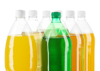 Assortment of bottles with tasty drinks, isolated on white