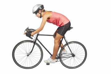 Obraz premium portrait of young female professional cycling athlete posing wit