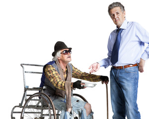 businessman gives money to the homeless