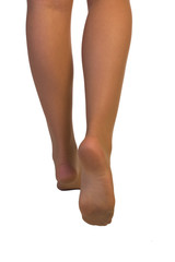 Legs in stockings and high heels isolated on white