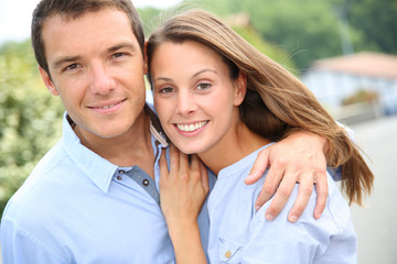 Obraz premium Portrait of cheerful and lovely couple