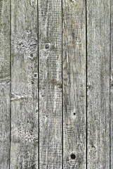 The texture of the old wooden boards.
