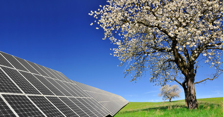 solar energy panels in spring landscape