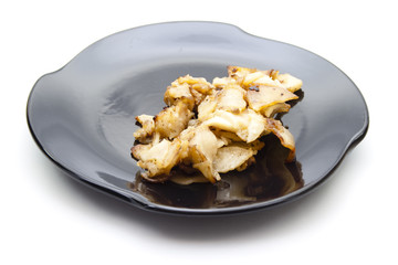 Bratkartoffel auf Keramik Teller