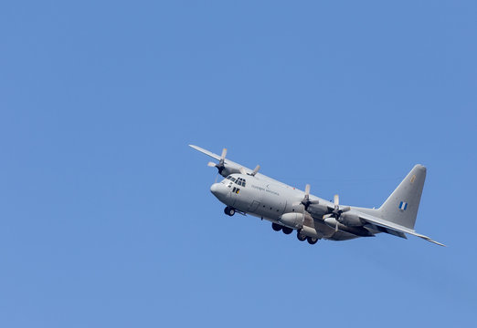 Military transport aircraft in flight