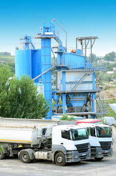 Trucks loading at a Concrete mixing factory